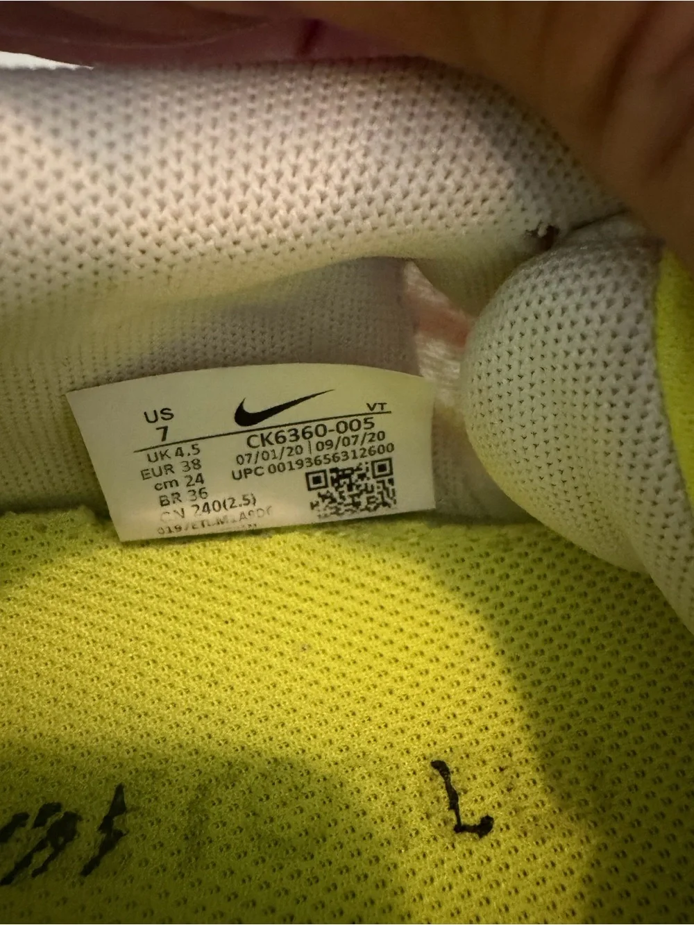 Nike women’s size 7 Renew Running Shoe pink orange yellow